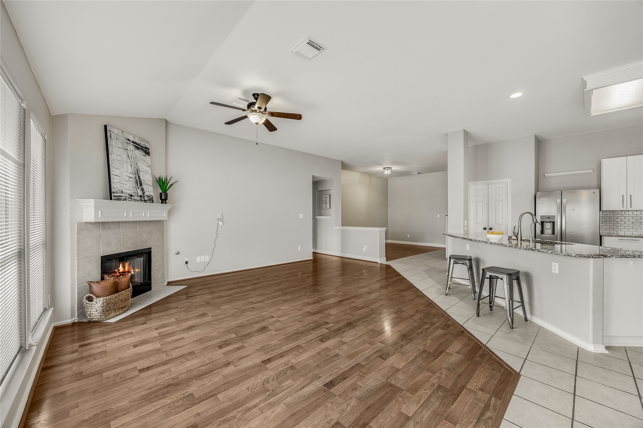 4319 South Summercrest Loop Round Rock, TX 78681 - Photo 7 of 35 a view of kitchen with livingroom and fireplace