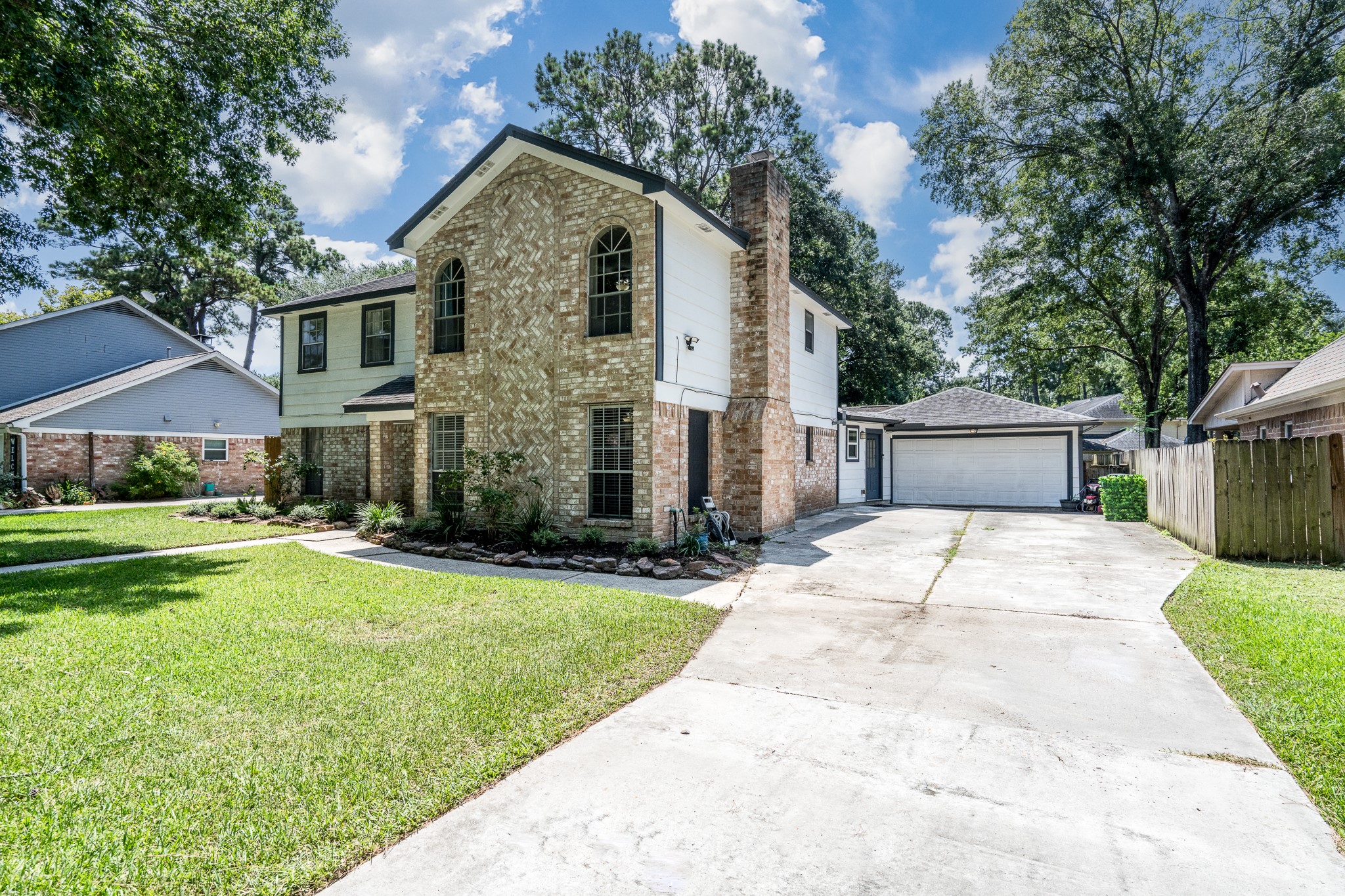 6527 Castle Pine Lane Spring, TX 77379 - Photo 3 of 47 A beautiful entrance welcomes you home with newly designed landscaping!