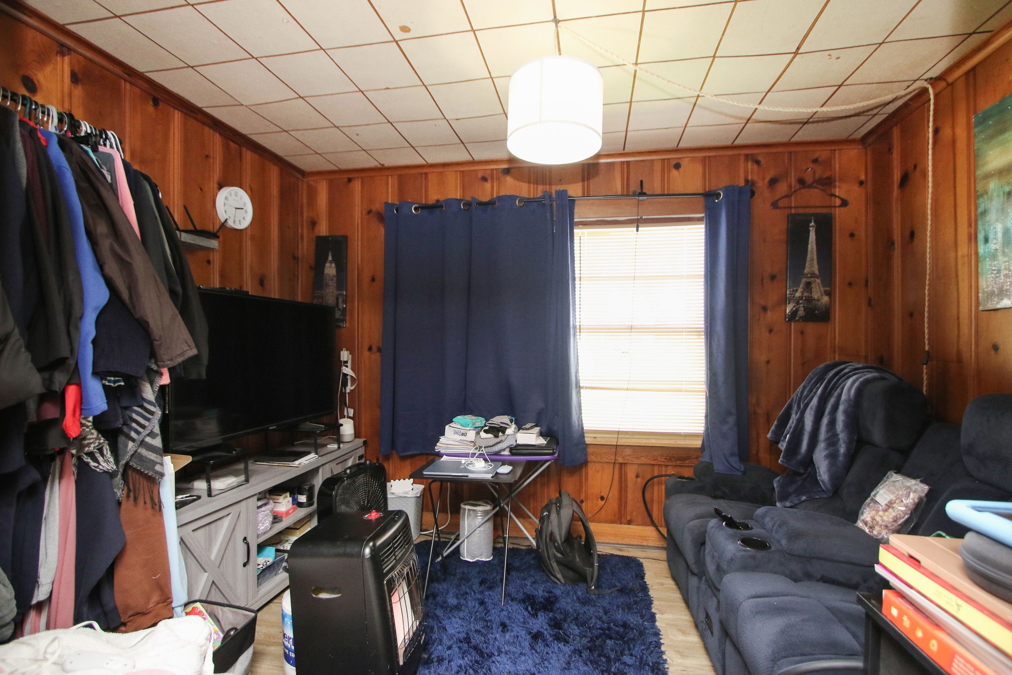 7610 Moore Road Pattison, TX 77423 - Photo 19 of 40 a living room with furniture a flat screen tv and a window