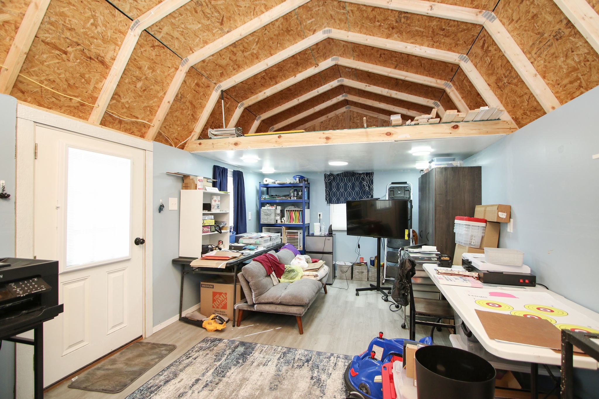 7610 Moore Road Pattison, TX 77423 - Photo 25 of 40 a room with furniture and a chandelier