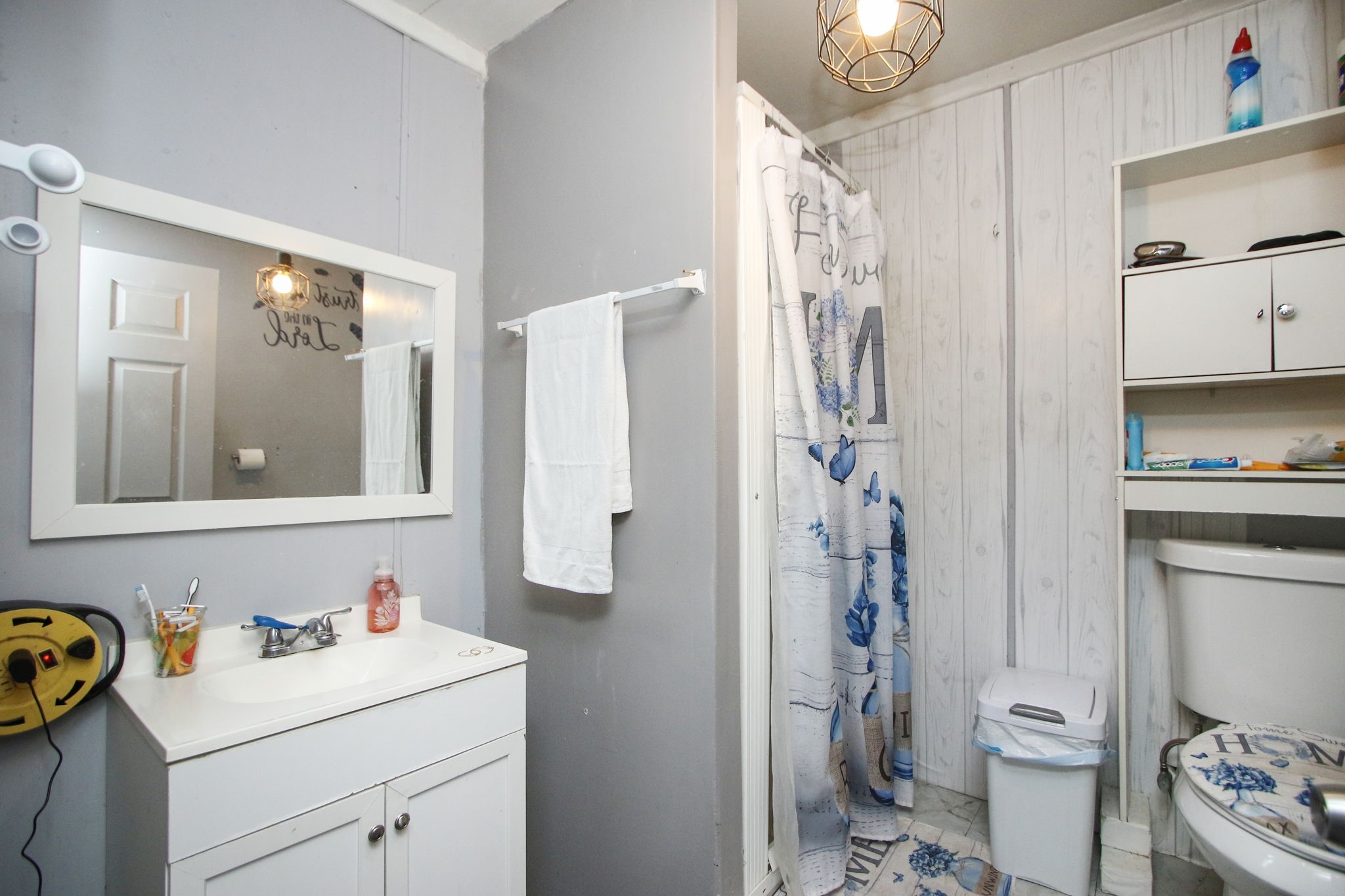 7610 Moore Road Pattison, TX 77423 - Photo 31 of 40 a bathroom with a sink toilet and shower