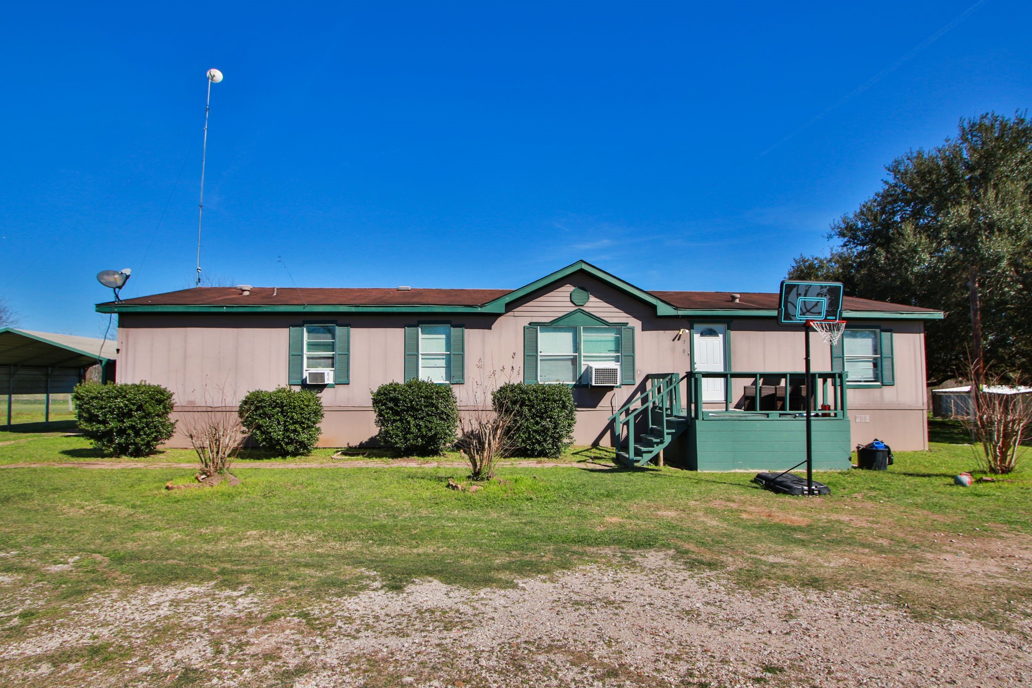 7610 Moore Road Pattison, TX 77423 - Photo 33 of 40 a front view of a house with a yard and garage