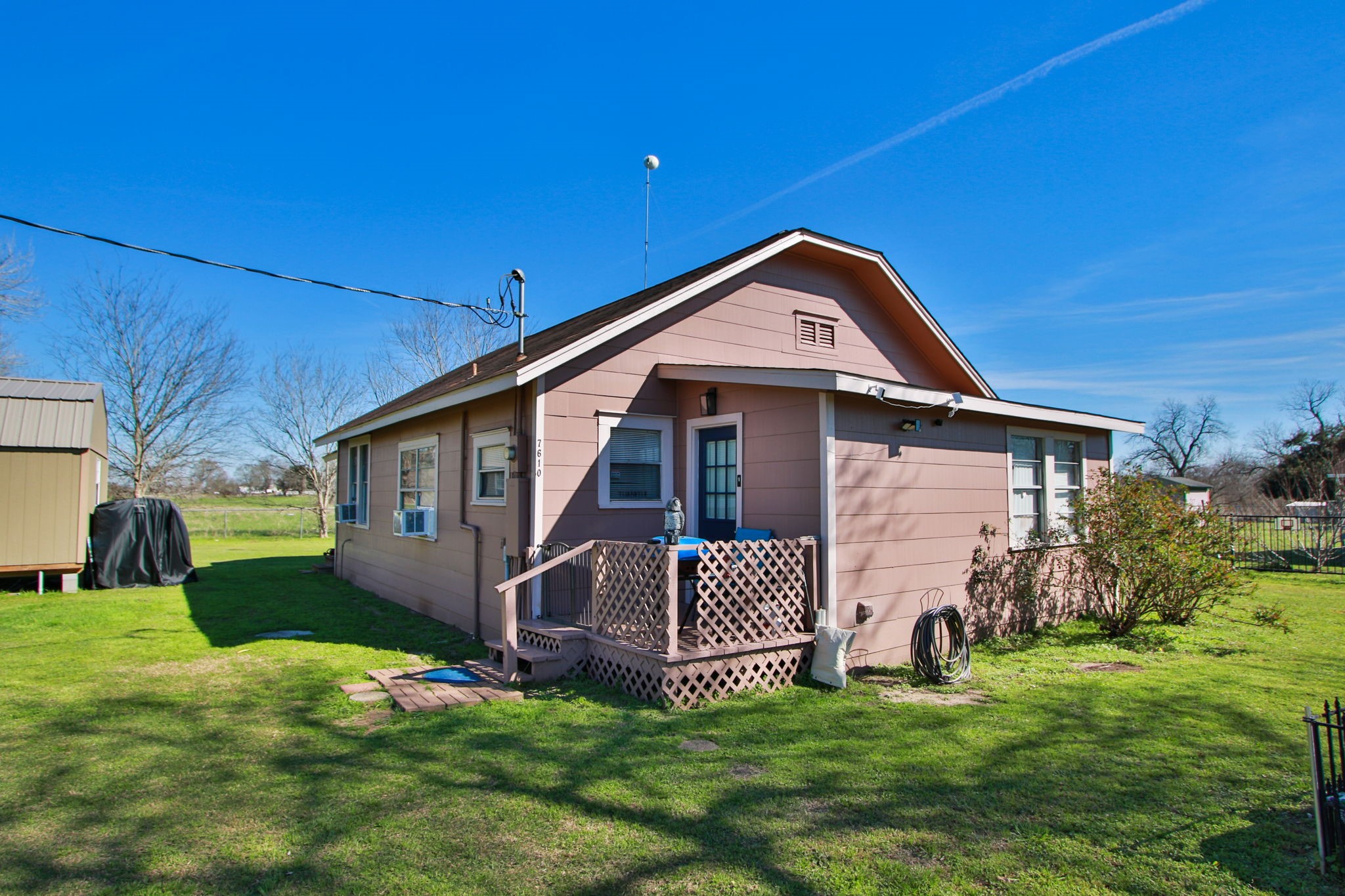 7610 Moore Road Pattison, TX 77423 - Photo 5 of 40 a front view of a house with a yard
