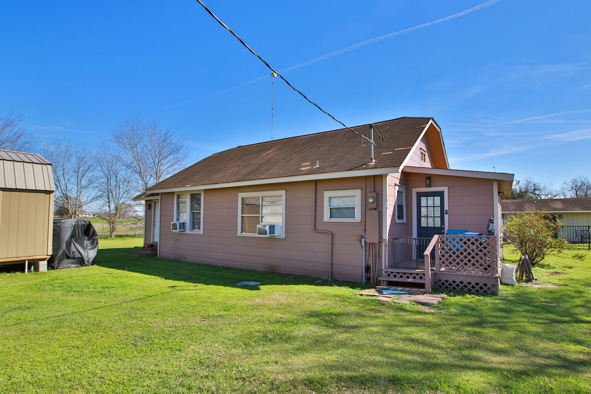 7610 Moore Road Pattison, TX 77423 - Photo 6 of 40 a backyard of a house with barbeque oven