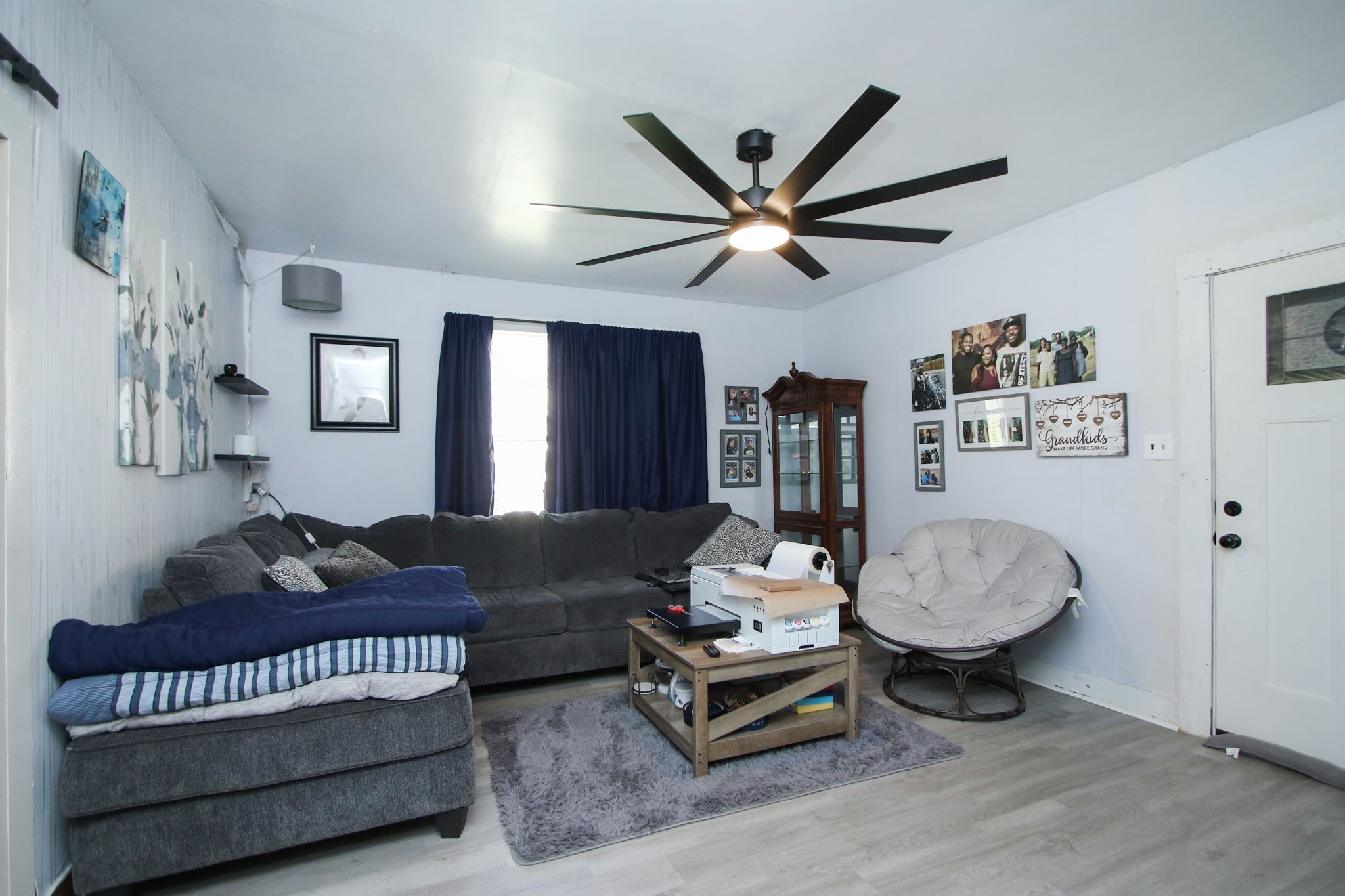 7610 Moore Road Pattison, TX 77423 - Photo 7 of 40 a living room with furniture and a ceiling fan