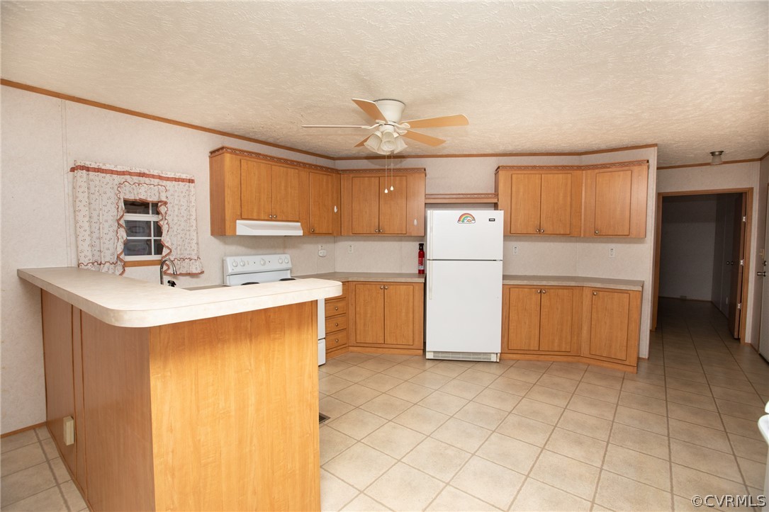 2625 Turkey Island Road Crewe, VA 23930 - Photo 11 of 45 a kitchen with stainless steel appliances granite countertop a refrigerator a sink dishwasher a stove with white cabinets and wooden floor
