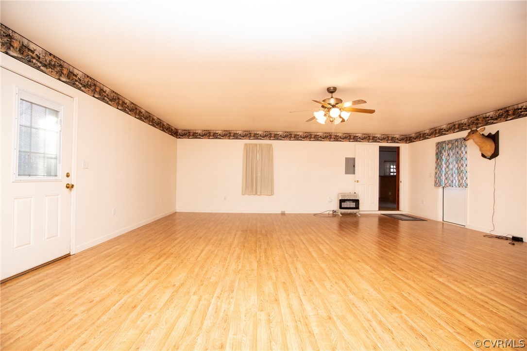 2625 Turkey Island Road Crewe, VA 23930 - Photo 13 of 45 wooden floor in an empty room with a window