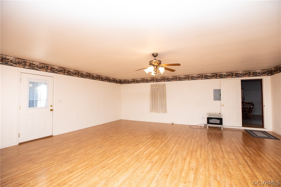 2625 Turkey Island Road Crewe, VA 23930 - Photo 15 of 45 a view of a room with wooden floor and a window