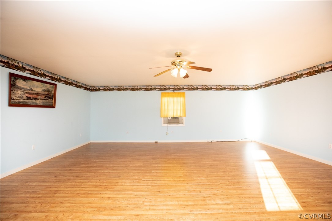 2625 Turkey Island Road Crewe, VA 23930 - Photo 17 of 45 a view of a room with rack and wooden floor