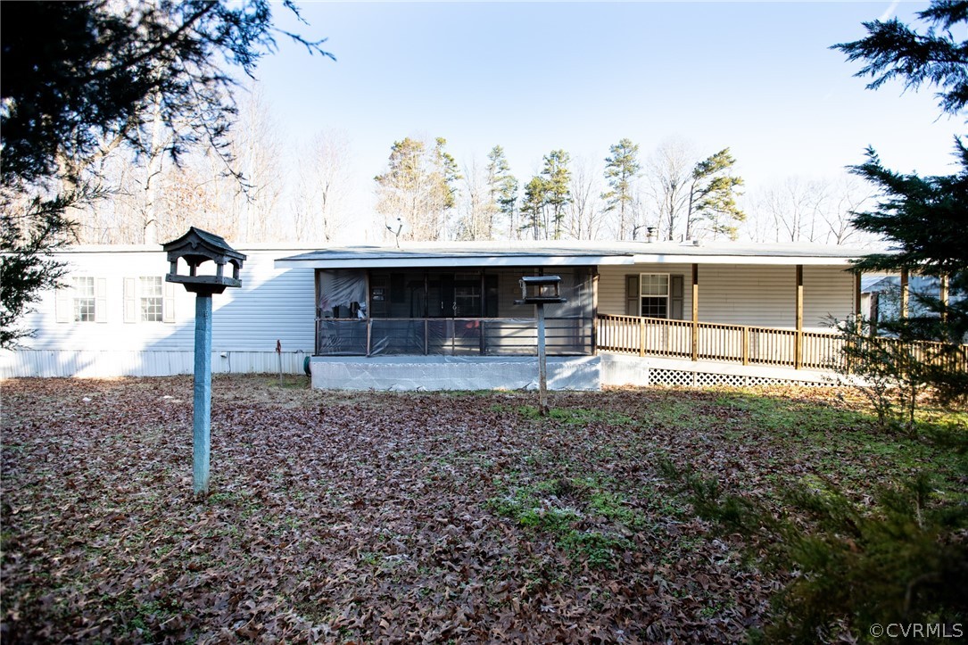 2625 Turkey Island Road Crewe, VA 23930 - Photo 2 of 45 a view of a house with a yard and sitting area