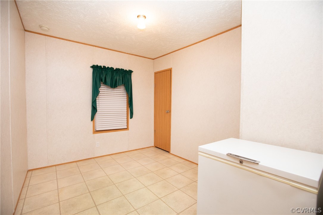 2625 Turkey Island Road Crewe, VA 23930 - Photo 26 of 45 a view of a storage & utility room with a window