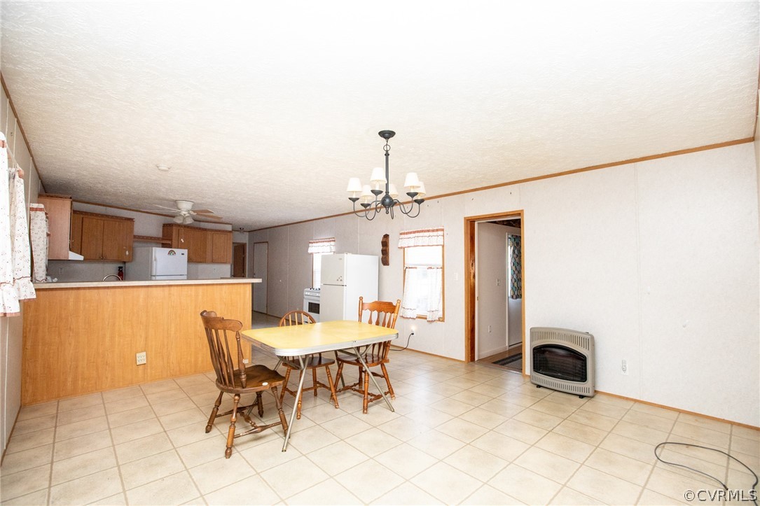 2625 Turkey Island Road Crewe, VA 23930 - Photo 10 of 45 a view of a dining room with furniture and chandelier