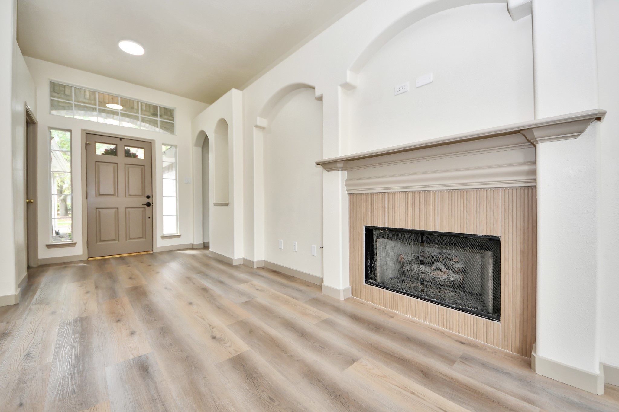 14423 Gadwall Court Houston, TX 77044 - Photo 20 of 42 a view of a livingroom with a fireplace and window
