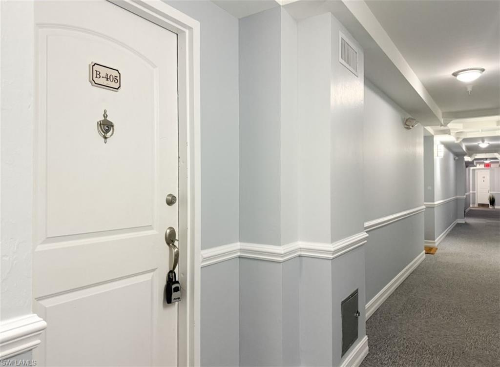 1100 Pine Ridge Road, Unit B405 Naples, FL 34108 - Photo 39 of 43 a view of a walk in closet