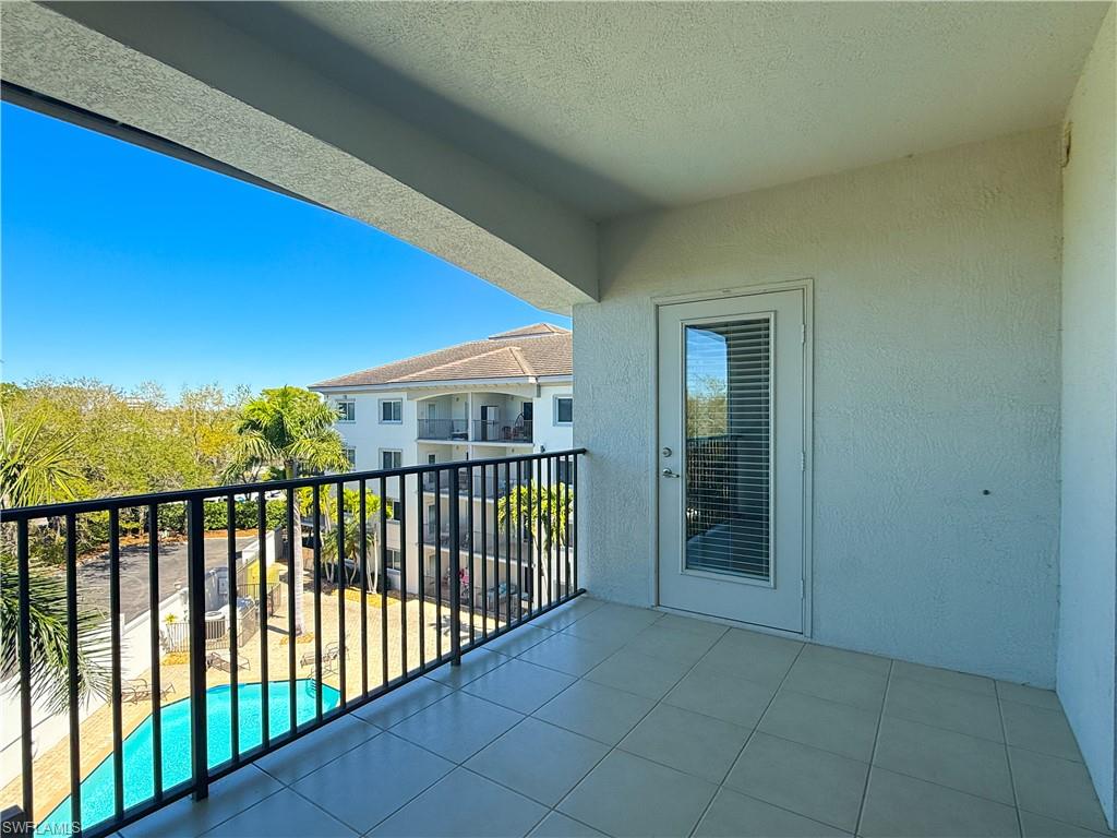 1100 Pine Ridge Road, Unit B405 Naples, FL 34108 - Photo 7 of 43 a view of a balcony
