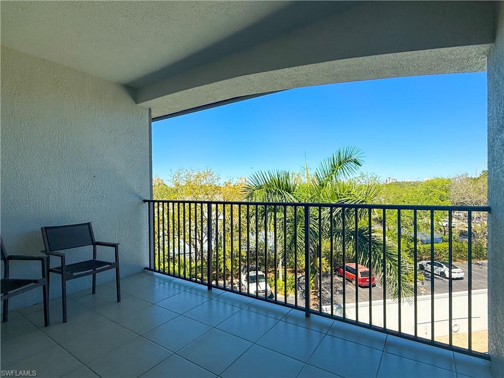 1100 Pine Ridge Road, Unit B405 Naples, FL 34108 - Photo 8 of 43 a view of a balcony