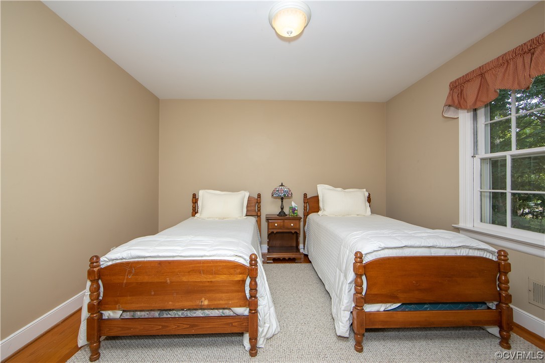 13371 Kingsmill Road Midlothian, VA 23113 - Photo 19 of 43 a bedroom with two beds and a window
