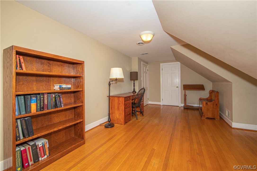 13371 Kingsmill Road Midlothian, VA 23113 - Photo 26 of 43 a view of room with furniture and wooden floor