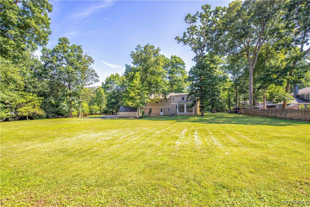 13371 Kingsmill Road Midlothian, VA 23113 - Photo 33 of 43 a view of a swimming pool with an outdoor space and seating area