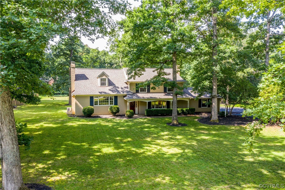 13371 Kingsmill Road Midlothian, VA 23113 - Photo 37 of 43 a view of a house with a yard porch and sitting area
