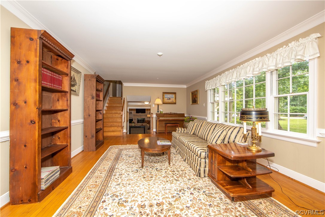 13371 Kingsmill Road Midlothian, VA 23113 - Photo 5 of 43 a living room with furniture and a rug