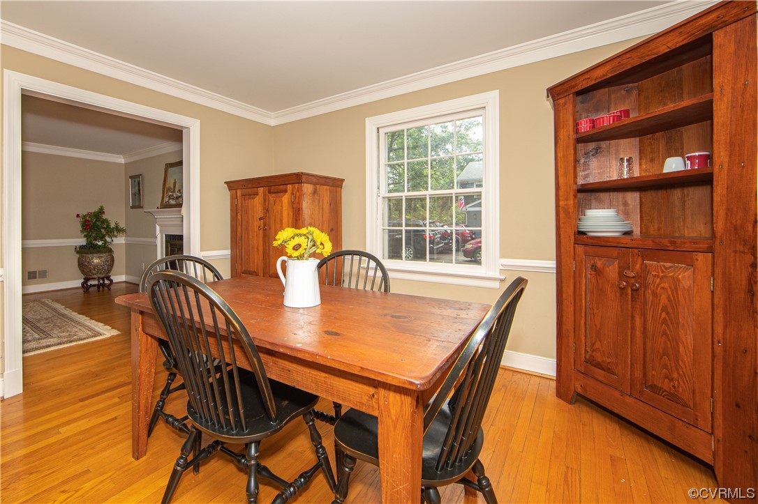 13371 Kingsmill Road Midlothian, VA 23113 - Photo 6 of 43 a view of a dining room with furniture window and wooden floor
