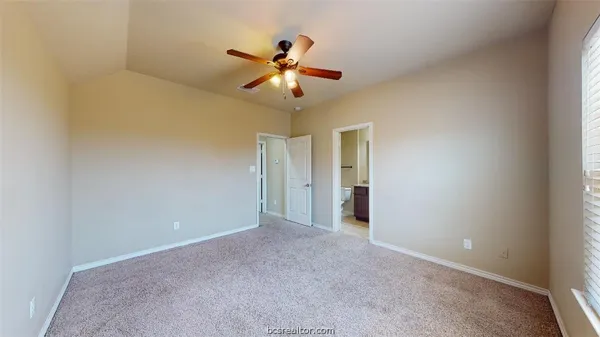 a view of a chandelier fan in a room