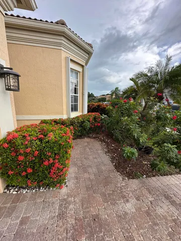 an aerial view of a houses with a lake view