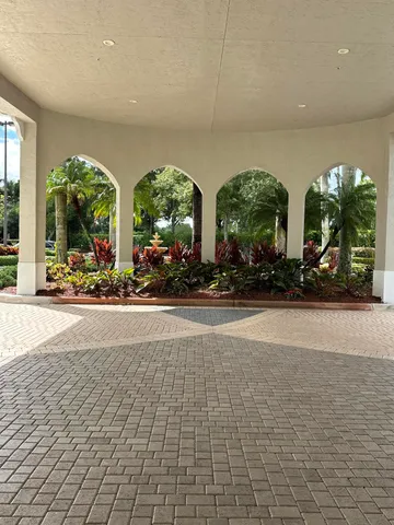 a living room with fireplace furniture and a wooden floor