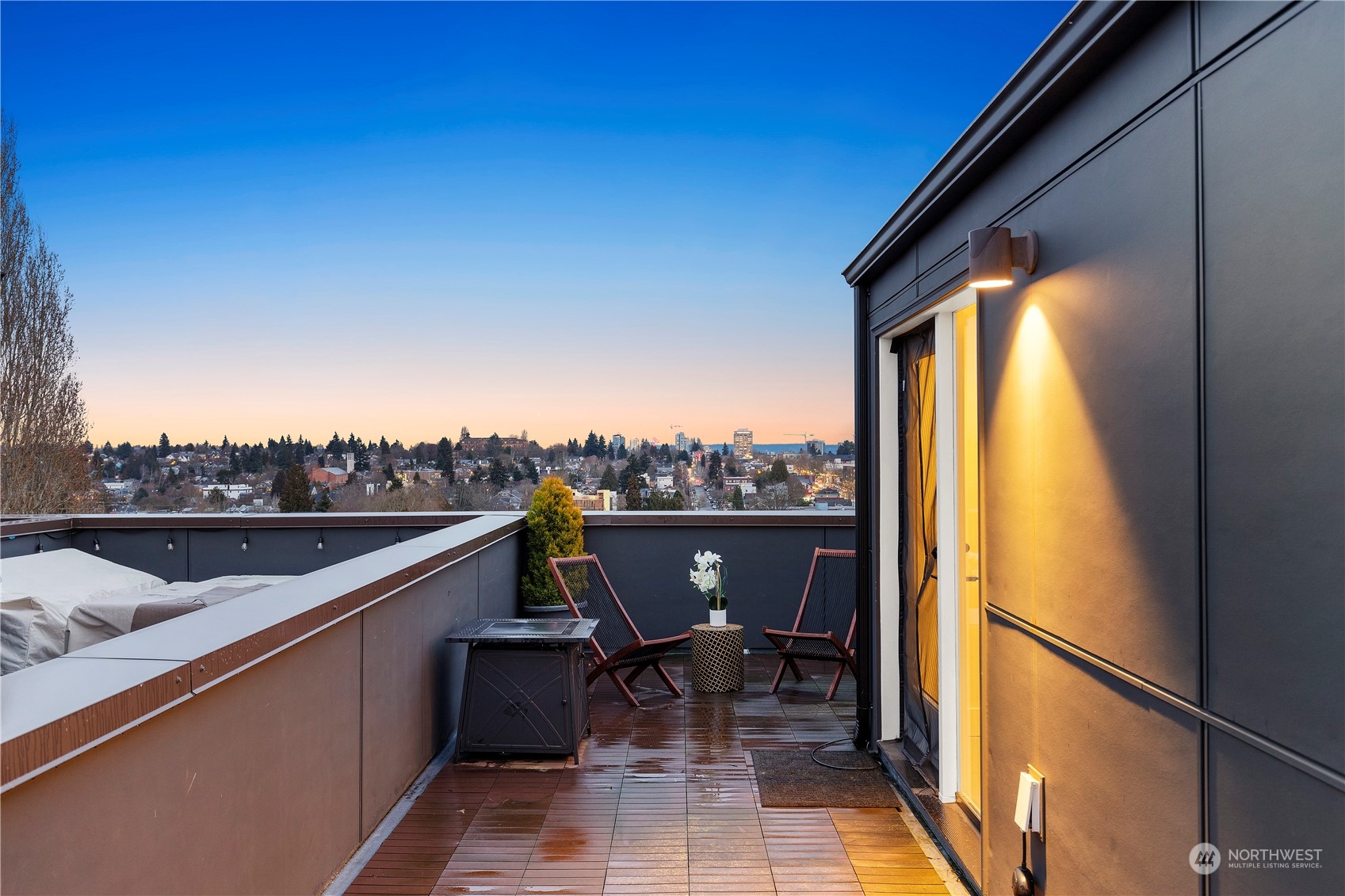 908 North 46th Street, Unit B Seattle, WA 98103 - Photo 29 of 32 a view of a terrace with furniture