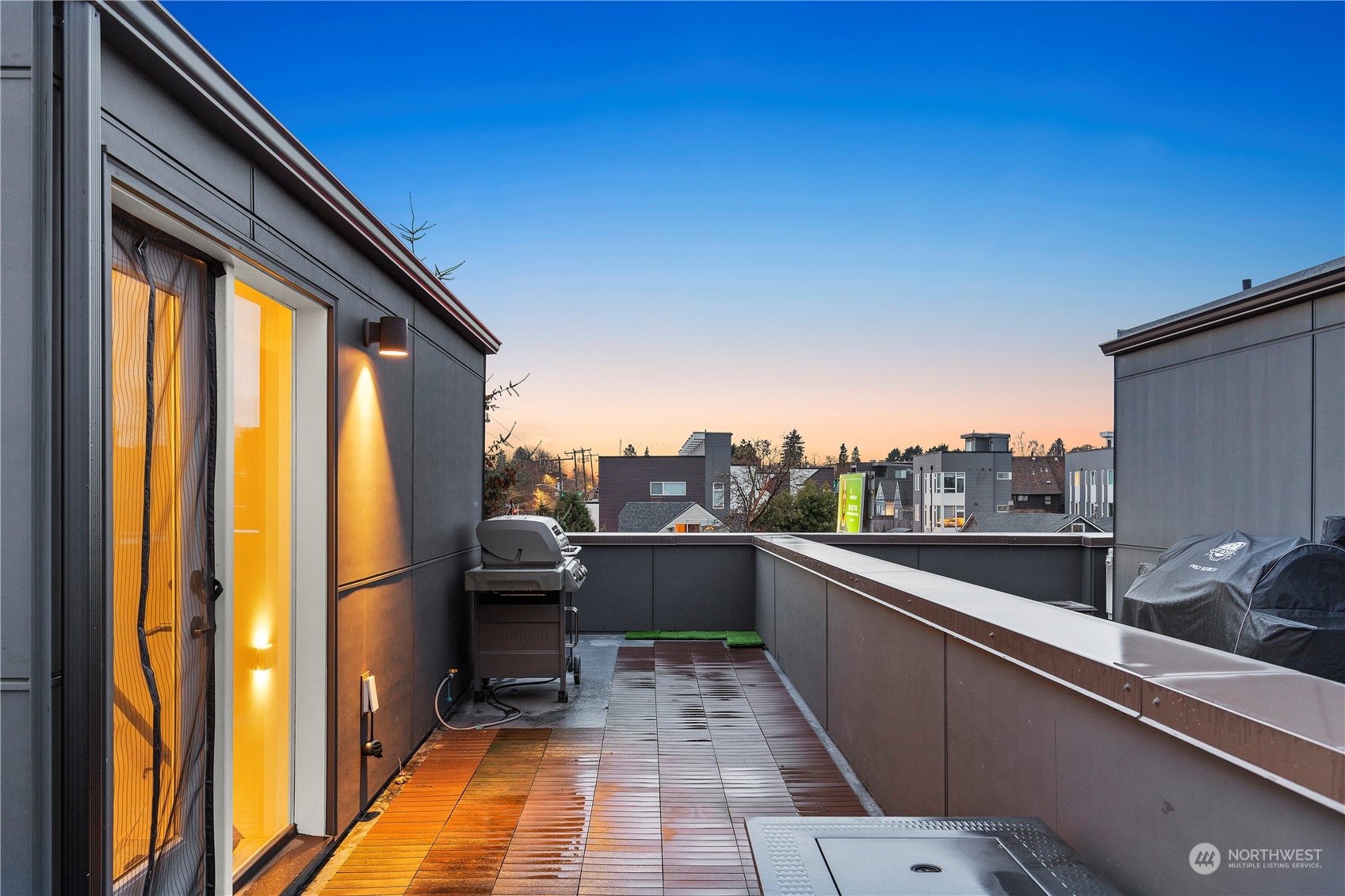 908 North 46th Street, Unit B Seattle, WA 98103 - Photo 31 of 32 a view of a balcony with furniture