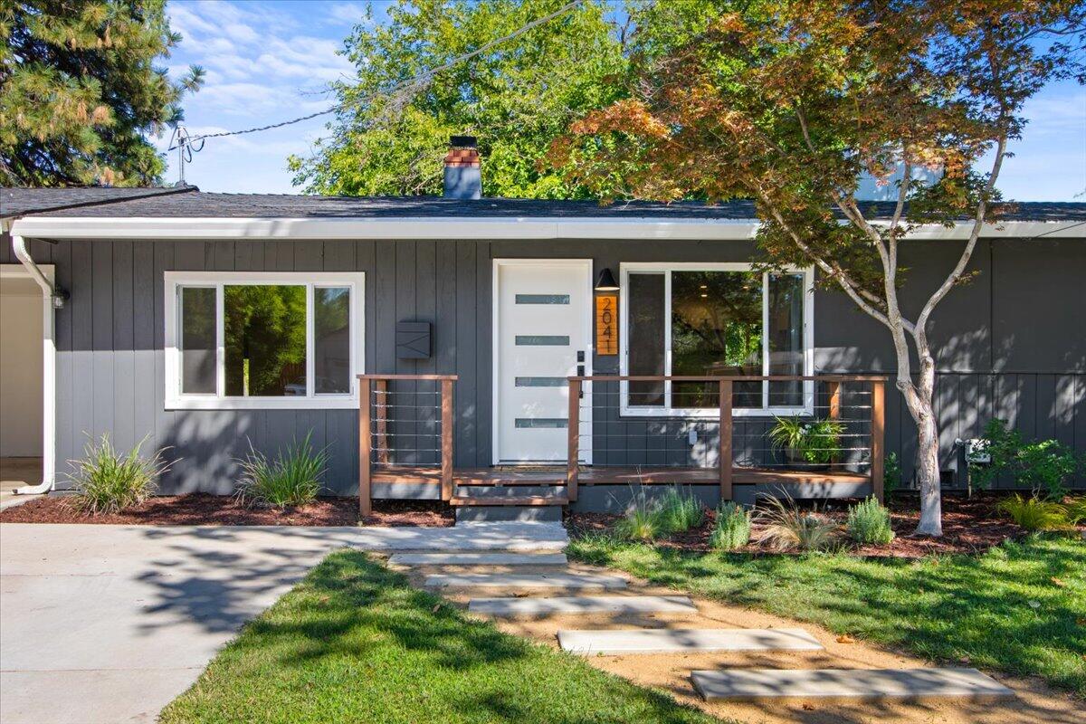 2041 Athens Avenue Redding, CA 96001 - Photo 1 of 36 front view of a house with a yard