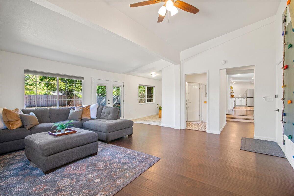 2041 Athens Avenue Redding, CA 96001 - Photo 14 of 36 a living room with furniture and a chandelier