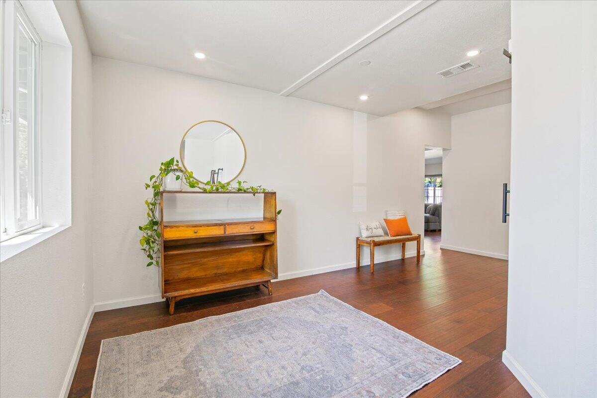 2041 Athens Avenue Redding, CA 96001 - Photo 15 of 36 a view of room with furniture and wooden floor