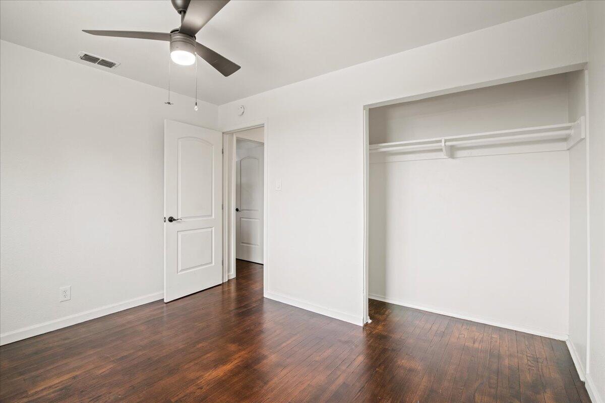 2041 Athens Avenue Redding, CA 96001 - Photo 26 of 36 a view of an empty room with wooden floor