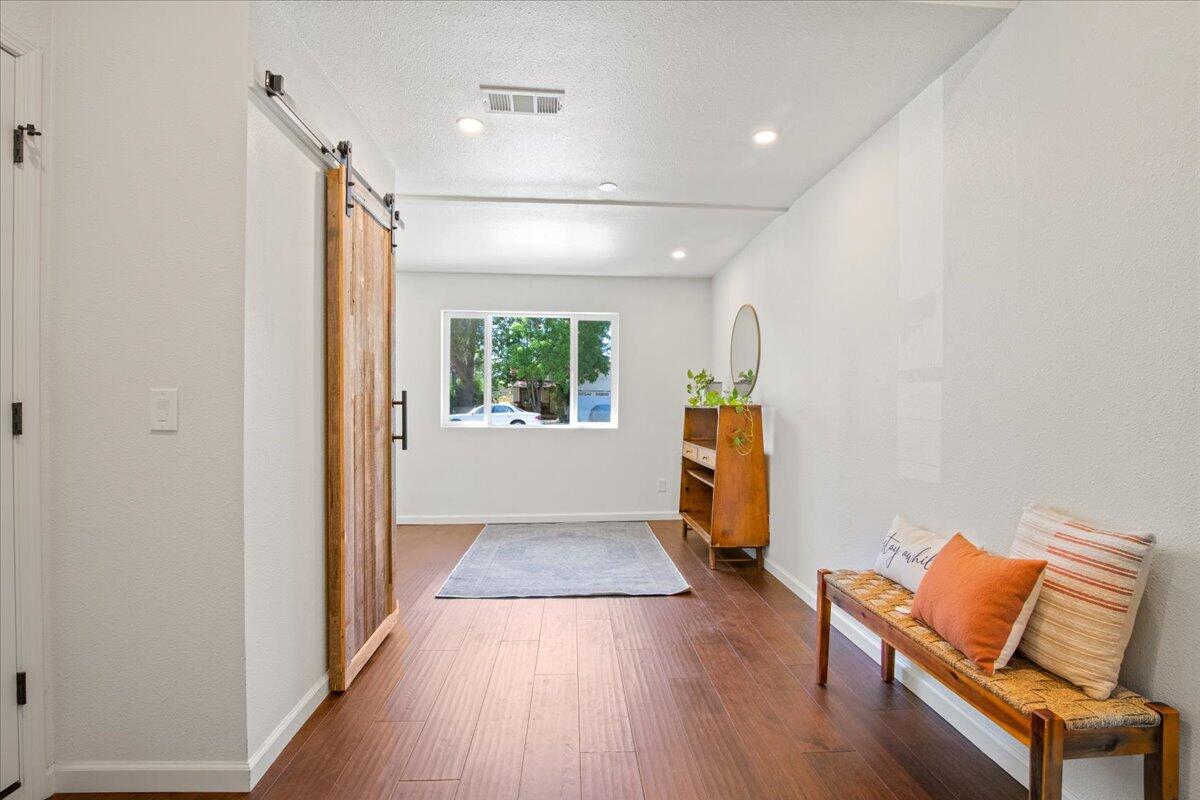 2041 Athens Avenue Redding, CA 96001 - Photo 28 of 36 wooden floor in an empty room with a window