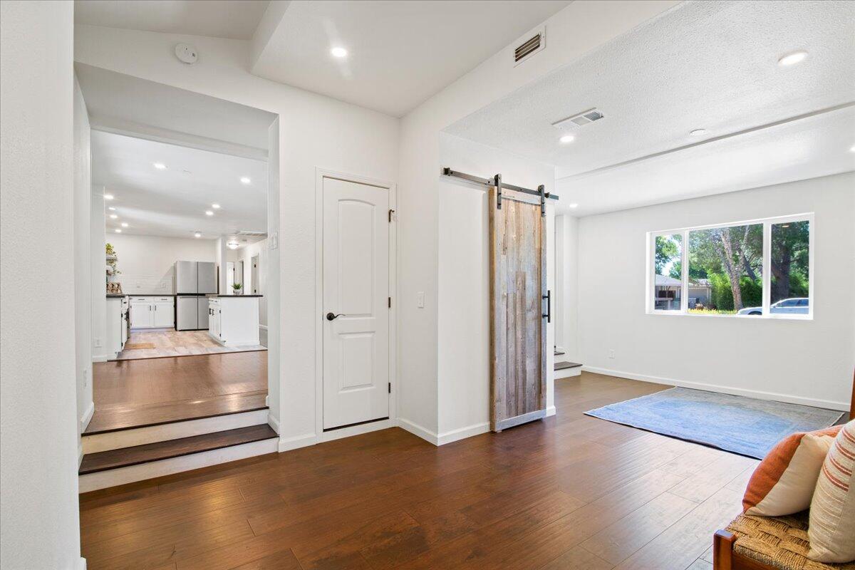 2041 Athens Avenue Redding, CA 96001 - Photo 29 of 36 a view of empty room with wooden floor and window