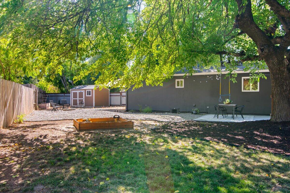 2041 Athens Avenue Redding, CA 96001 - Photo 35 of 36 a backyard of a house with lots of green space