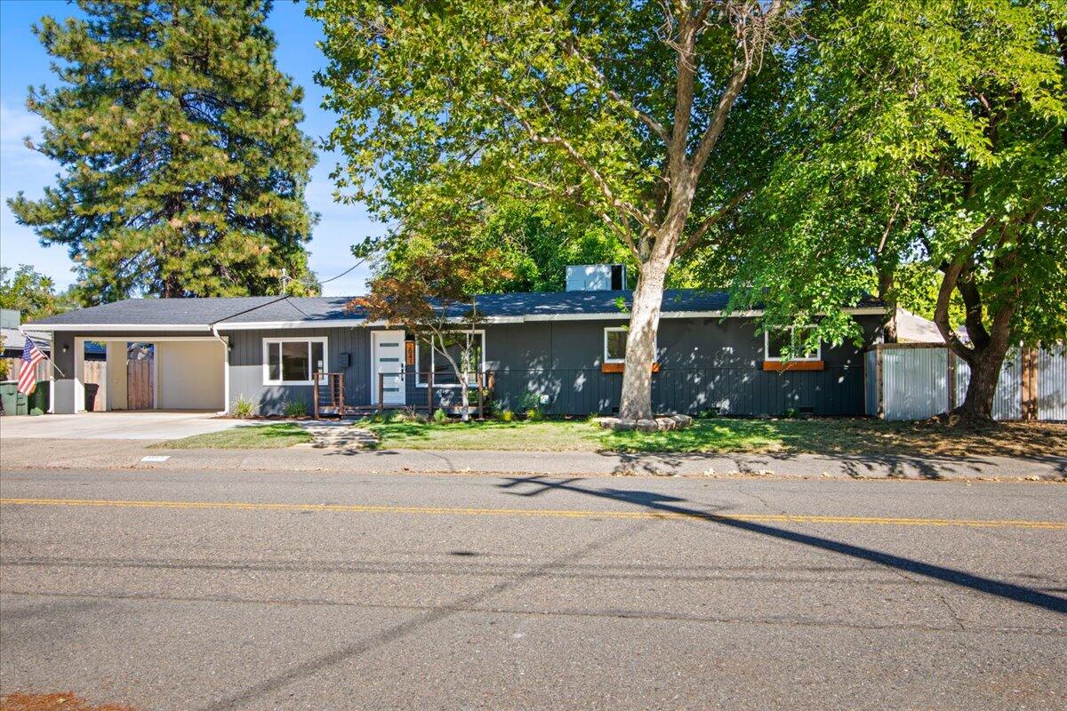 2041 Athens Avenue Redding, CA 96001 - Photo 36 of 36 front view of a house with a yard and an trees