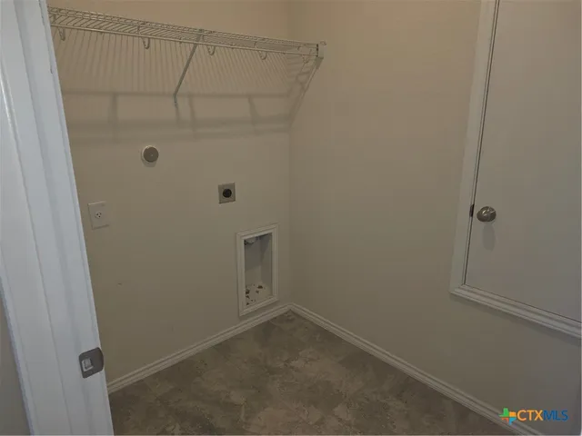 a bathroom with a granite countertop sink toilet and vanity