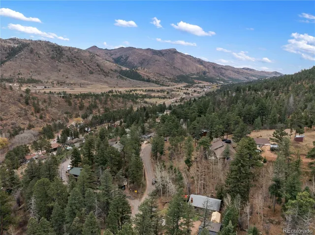 a view of a city with mountains