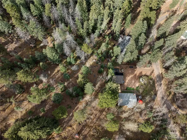 an aerial view of multiple house with yard