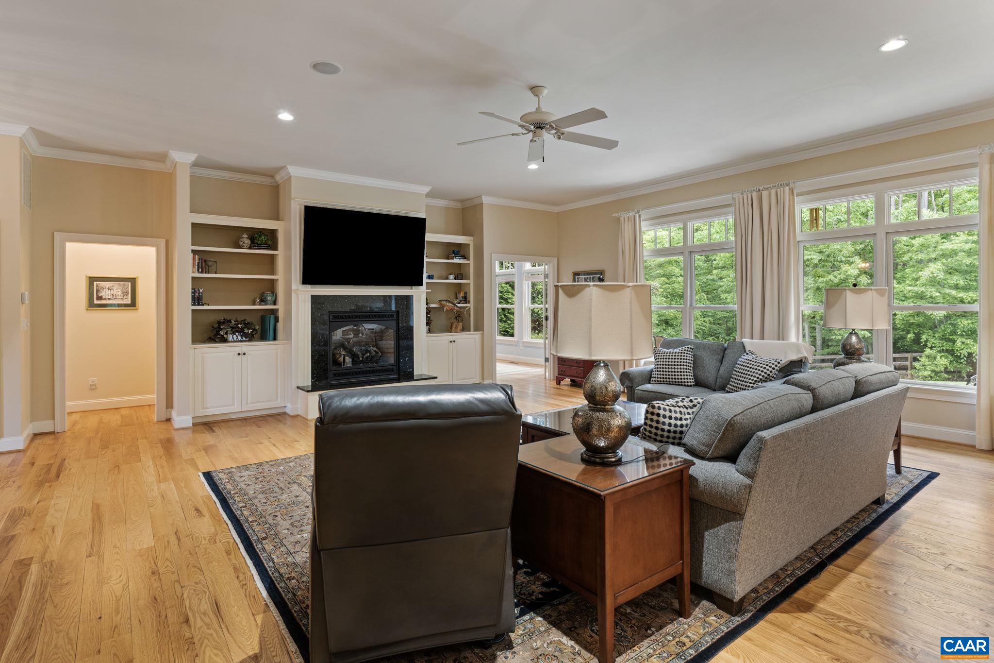 2025 Farringdon Road Keswick, VA 22947 - Photo 11 of 55 a living room with furniture and a flat screen tv