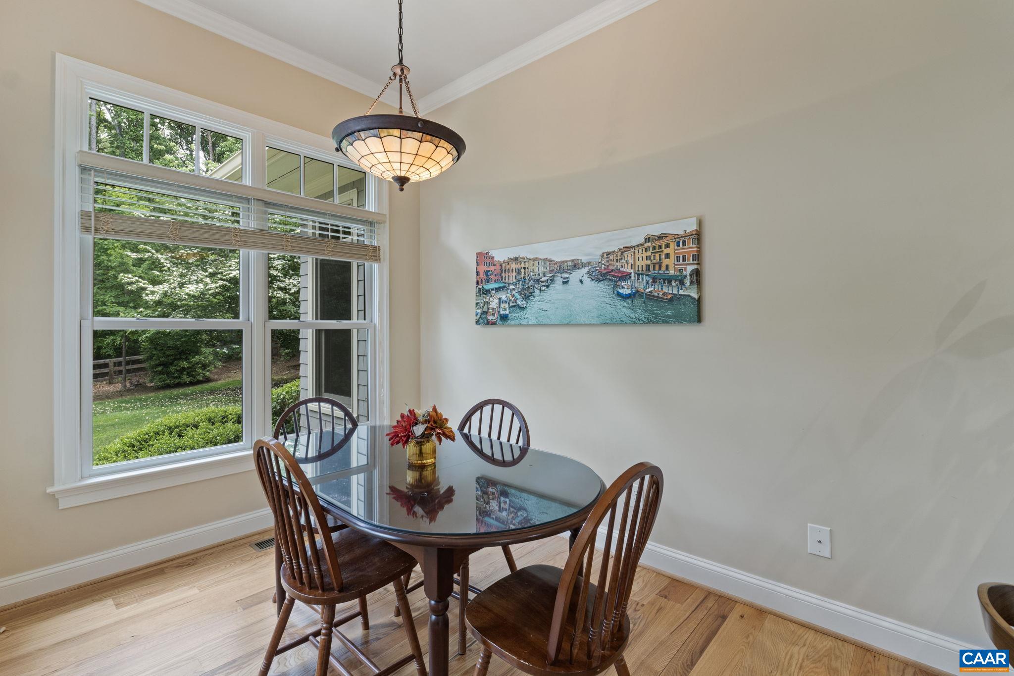 2025 Farringdon Road Keswick, VA 22947 - Photo 19 of 55 a view of a dining room with furniture window and wooden floor