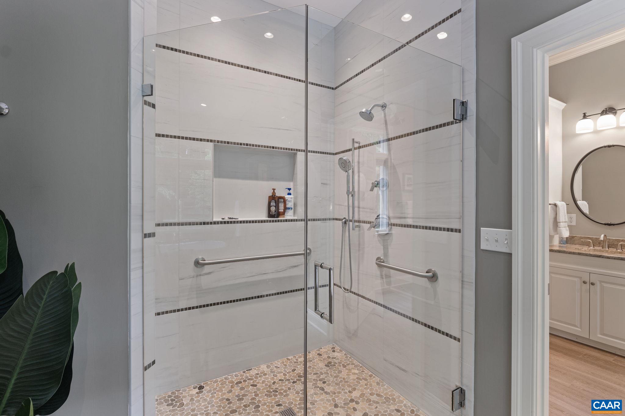 2025 Farringdon Road Keswick, VA 22947 - Photo 30 of 55 a bathroom with a shower and mirror