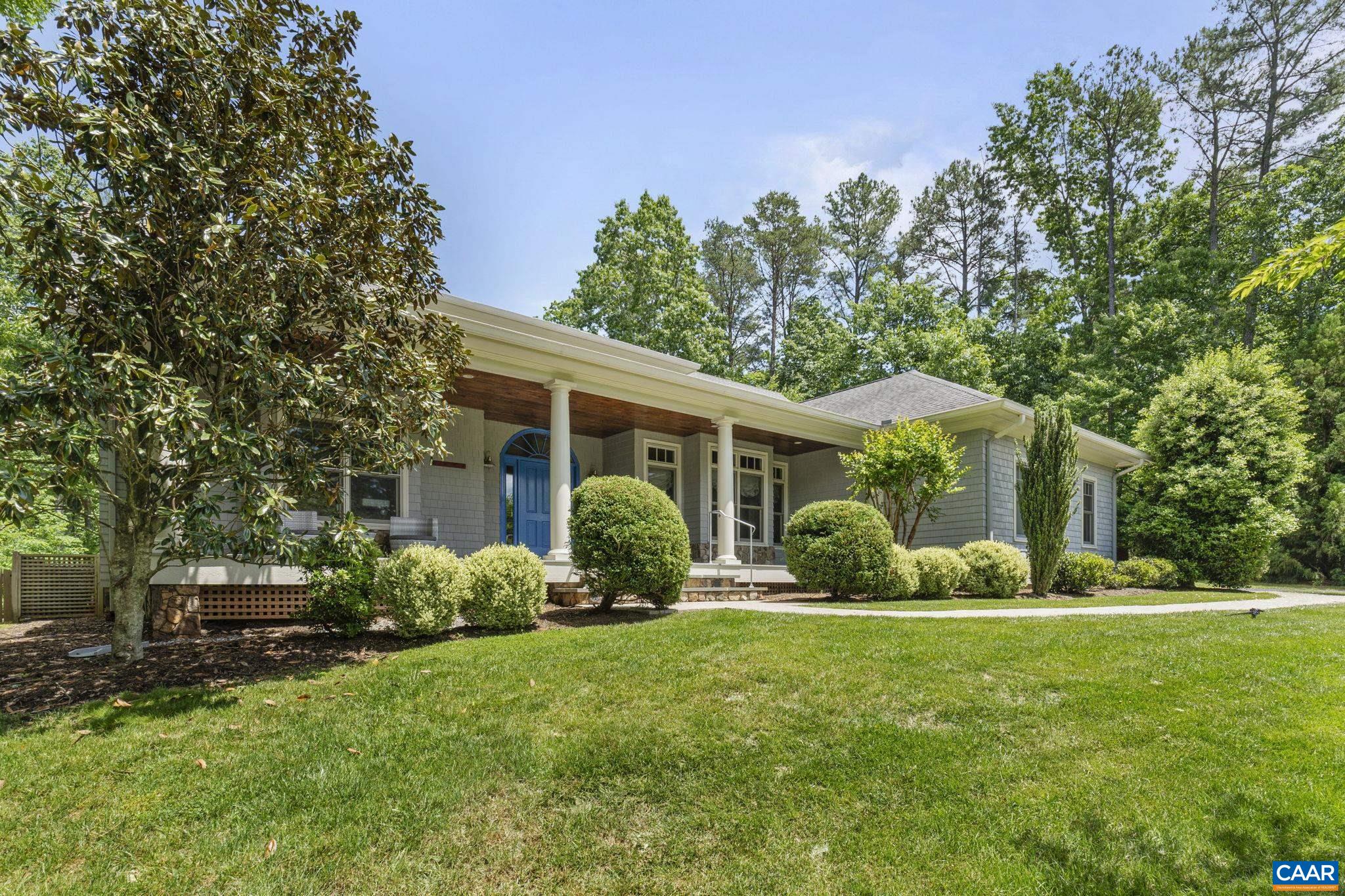 2025 Farringdon Road Keswick, VA 22947 - Photo 3 of 55 a front view of house with yard and green space