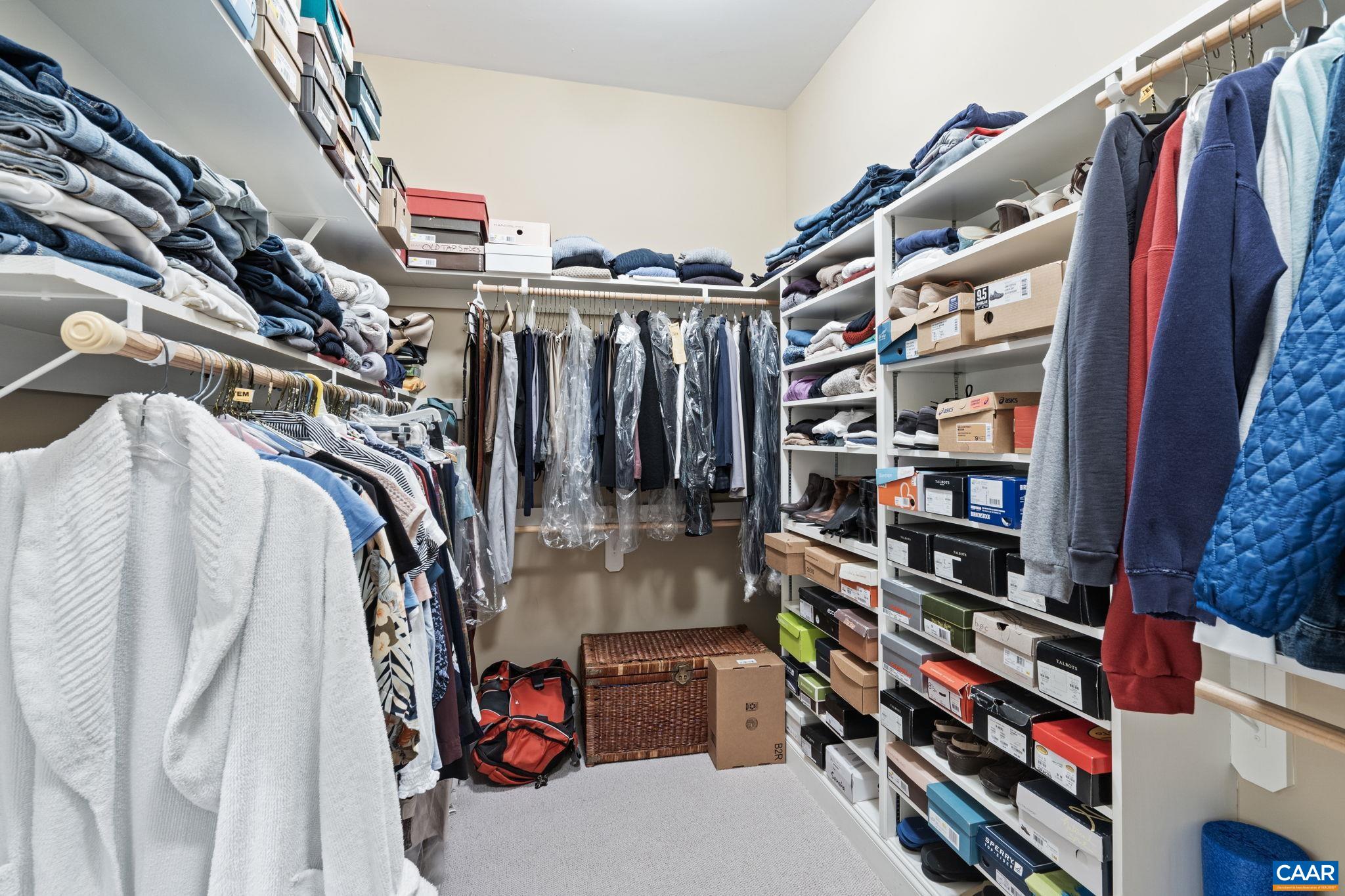 2025 Farringdon Road Keswick, VA 22947 - Photo 33 of 55 a view of walk in closet with clothes and shoes