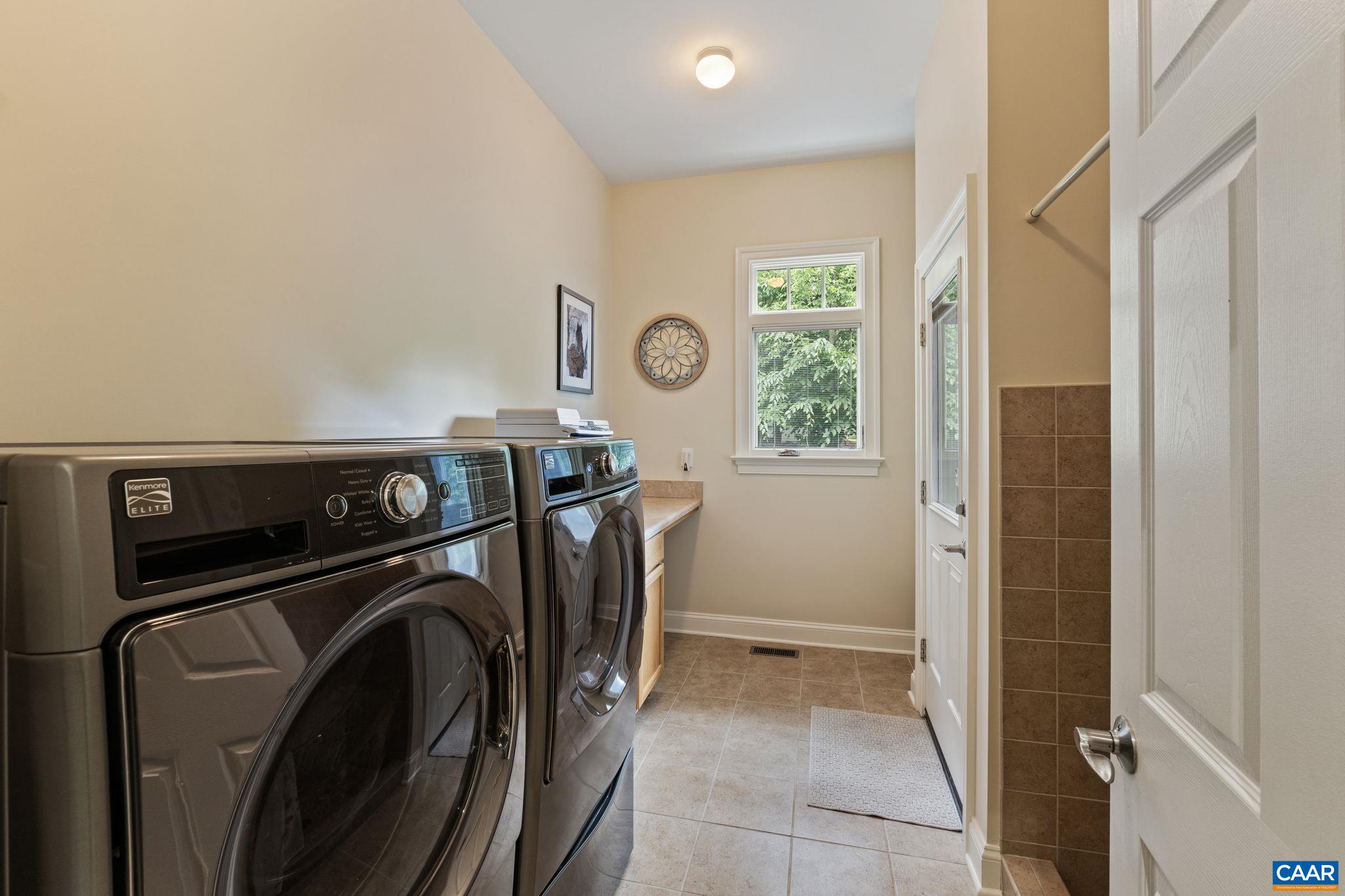 2025 Farringdon Road Keswick, VA 22947 - Photo 37 of 55 a utility room with dryer and washer