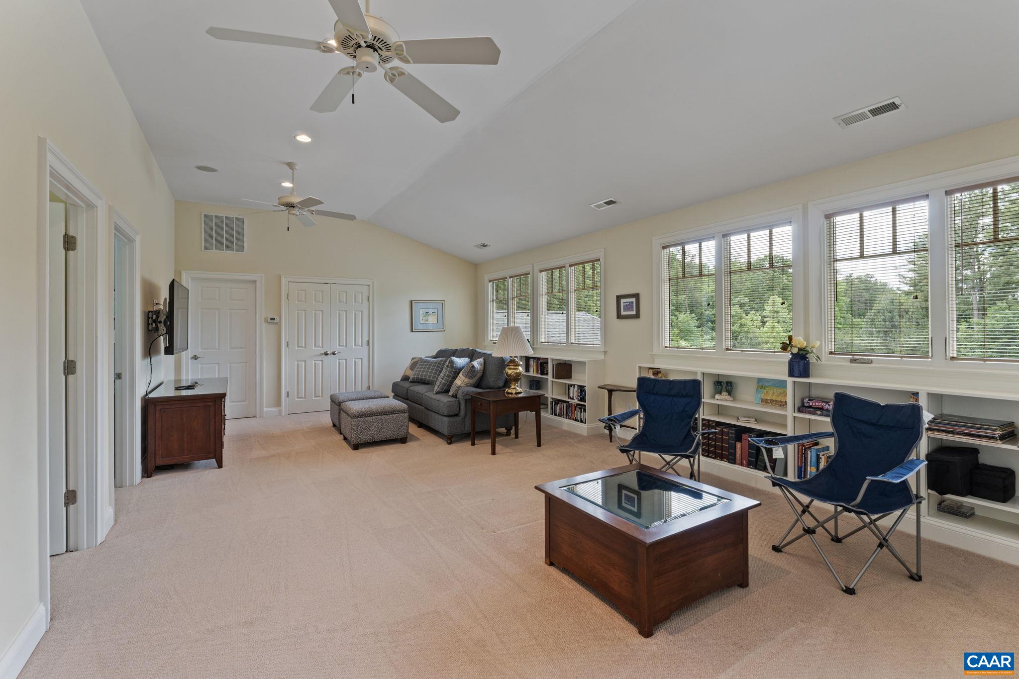 2025 Farringdon Road Keswick, VA 22947 - Photo 39 of 55 a living room with furniture and a large window