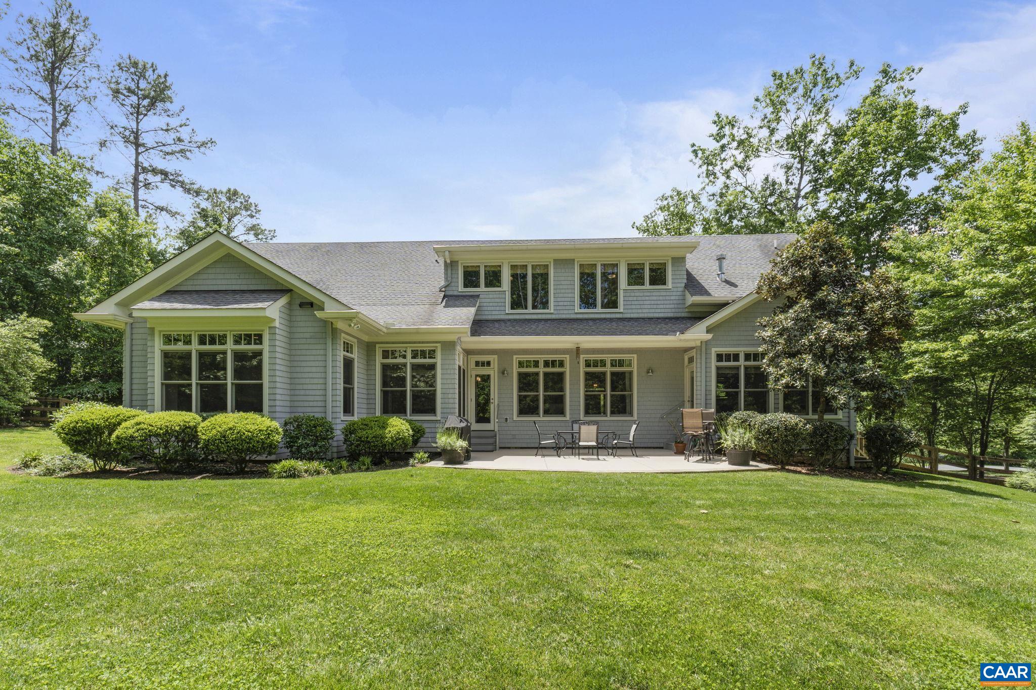 2025 Farringdon Road Keswick, VA 22947 - Photo 4 of 55 a front view of a house with garden and plants